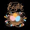 Easter eggs in a wicker nest. Luxury lettering Happy Easter Hand drawn calligraphy on a blacke background.