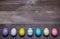 Easter eggs on a wooden background