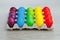 Easter festive multicolor eggs carton