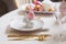 Easter festive table details. Dining place decorated in trendy scandinavian style