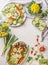 Easter food background. Various meals plates with boiled eggs. Easter lunch. Top view