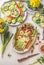 Easter food.  Plates with boiled eggs served on white table background. Traditional Easter family breakfast or brunch . Top view