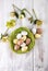 Easter green decoration over wood top view