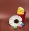Easter greeting image. Chicken with red bascet, and flower