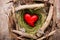 Easter heart decor on a wooden background. Pattern.