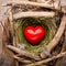 Easter heart decor on a wooden background. Pattern.