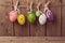 Easter holiday background with eggs decorations hanging on rope