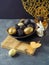 Easter holiday decorations with golden and black Easter eggs over elegant background