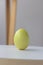 Easter holiday. Delicate eggs in pastel color on a blurred background