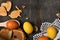 Easter holiday still life and decorations, easter eggs, cookies in the shape of rabbit and heart on dark wooden background, blank