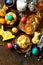 Easter holiday table. Easter cakes and colored eggs on a wooden table.