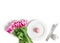 Easter holiday table setting with pink chicken egg, rabbit and tulip flowers on a white background. Copy space, top view