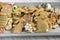 Easter homemade hand painted gingerbread cookies on grey wooden tray