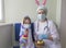 Easter in the hospital: the doctor nurse gives the girl a chocolate egg