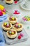 Easter mini brownie cheesecake Bird`s Nest with chocolate and candy eggs. Easter dessert. Funny food idea for children.