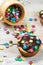 Easter muffins with candies and chocolate glaze