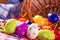 Easter. Multicolored easter eggs in a basket on a wooden table