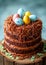 Easter Nest Cake with Speckled Eggs and Greenery. Easter dessert