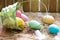 Easter organic colorful decoration eggs in chicken coop spring abstract background