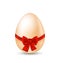 Easter paschal egg with red bow, isolated