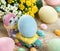 Easter rabbit figurine with colorful eggs