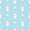 Easter rabbit seamless pattern on blue background