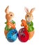Easter rabbits with colored traditional easter eggs, quails egg, , close up, isolated
