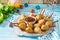 Easter recipe, festive appetizer. Meat in biscuits, deep fried served with ketchup sauce