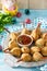 Easter recipe, festive appetizer. Meat in biscuits, deep fried served with ketchup sauce