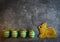 Easter shortcrust traditional cookie pastry knolling with colorful eggs on grey grunge dark background