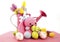 Easter Spring theme pink watering can with easter eggs and handmade crochet knit wool bunny