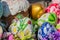 Easter street vestival in Moscow, Russia. Wicker basket full of painted easter eeggs, cake and flowers
