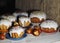 Easter. Traditional Easter pastries, painted onion peel eggs on a natural tablecloth. Night dark shots. Sprinkled with natural