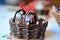 Easter traditional eggs black and red in a woven basket.
