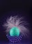 Easter turquoise egg with a beautiful pink feather