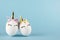 Easter unicorn couple of eggs isolated on blue background. Happy easter banner. Kids activity inspiration. Greeting card