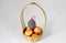 Easter varicoloured eggs on a white background.duck wickerwork from willow twigs
