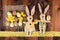 Easter vintage retro decoration with lovely funny bunny on dark wooden background