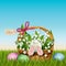 Easter wicker basket with rabbit and flowers