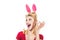 Easter woman. Woman wearing a mask Easter bunny and looks very sensually. Pinup woman in bunny ears with Easter egg