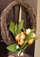 Easter wreath. Spring decoration on the wooden door of the house