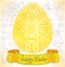 Easter yellow card with egg and floral ornament