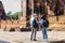 Eastern Asia summer holidays. Caucasian man and Asian woman tourist from back looking at Wat Chaiwatthanaram temple. Tourist