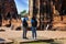 Eastern Asia summer holidays. Caucasian man and Asian woman tourist from back looking at Wat Chaiwatthanaram temple. Tourist