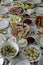 Eastern breakfast table setting in Poland with plates, silverware and delicious dishes