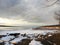 Eastern Cayuga Lake in a cloudy winter sunset