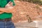 Eastern Chipmunk standing on wooden log in Bryce canyon national park, USA