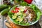 Eastern cuisine. Summer lunch, healthy salad with couscous, grilled vegetables.