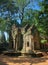 Eastern entrance to the main gallery of Ta Prohm temple ruins, located in the Angkor Wat complex near Siem Reap, Cambodia.