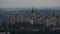 Eastern European Town Skyline With Orthodox Church Surrounded By Communistic Apartments